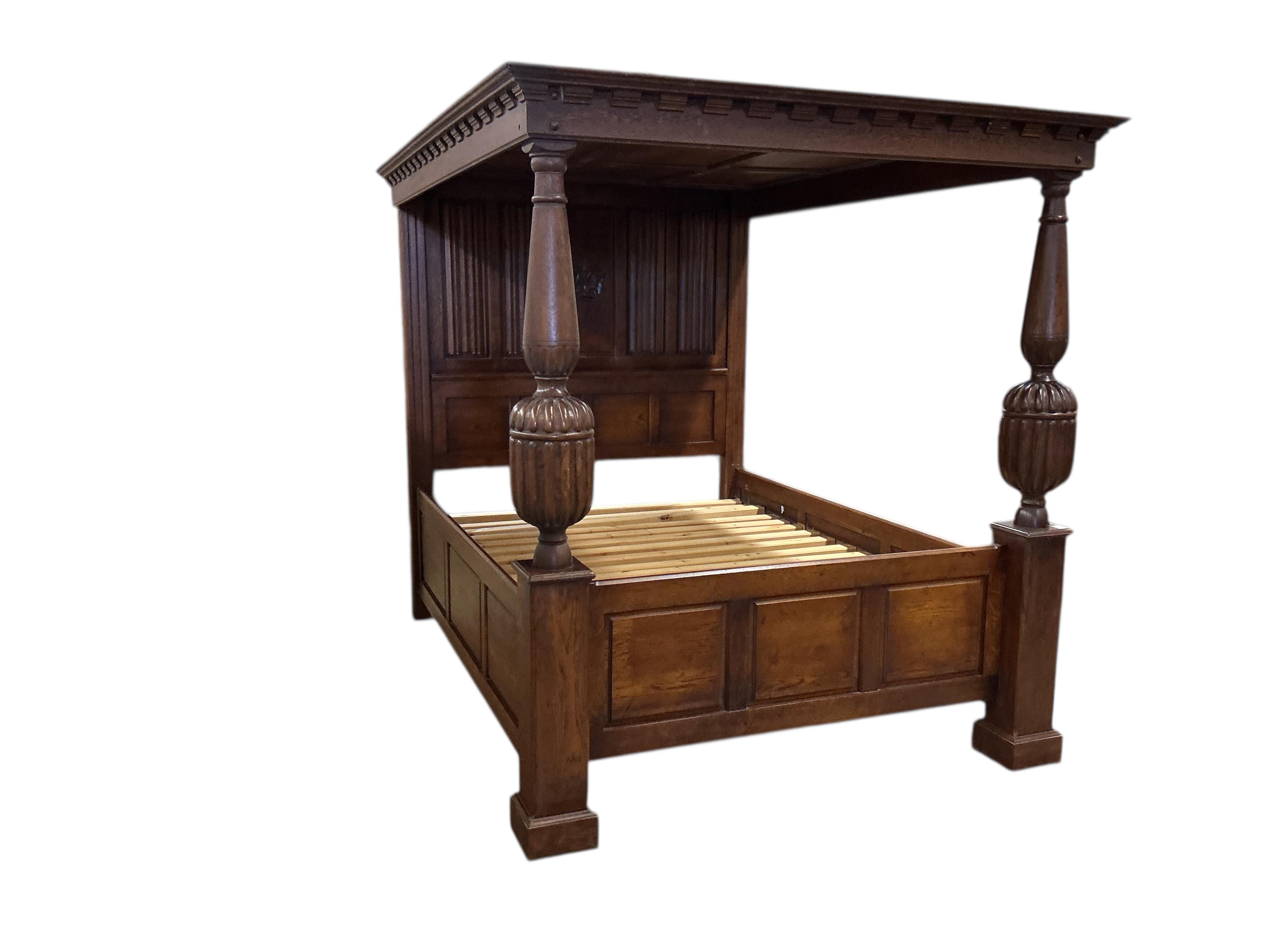 A reproduction Tudor style oak four poster bed, width 174cm, length 230cm, height 198cm